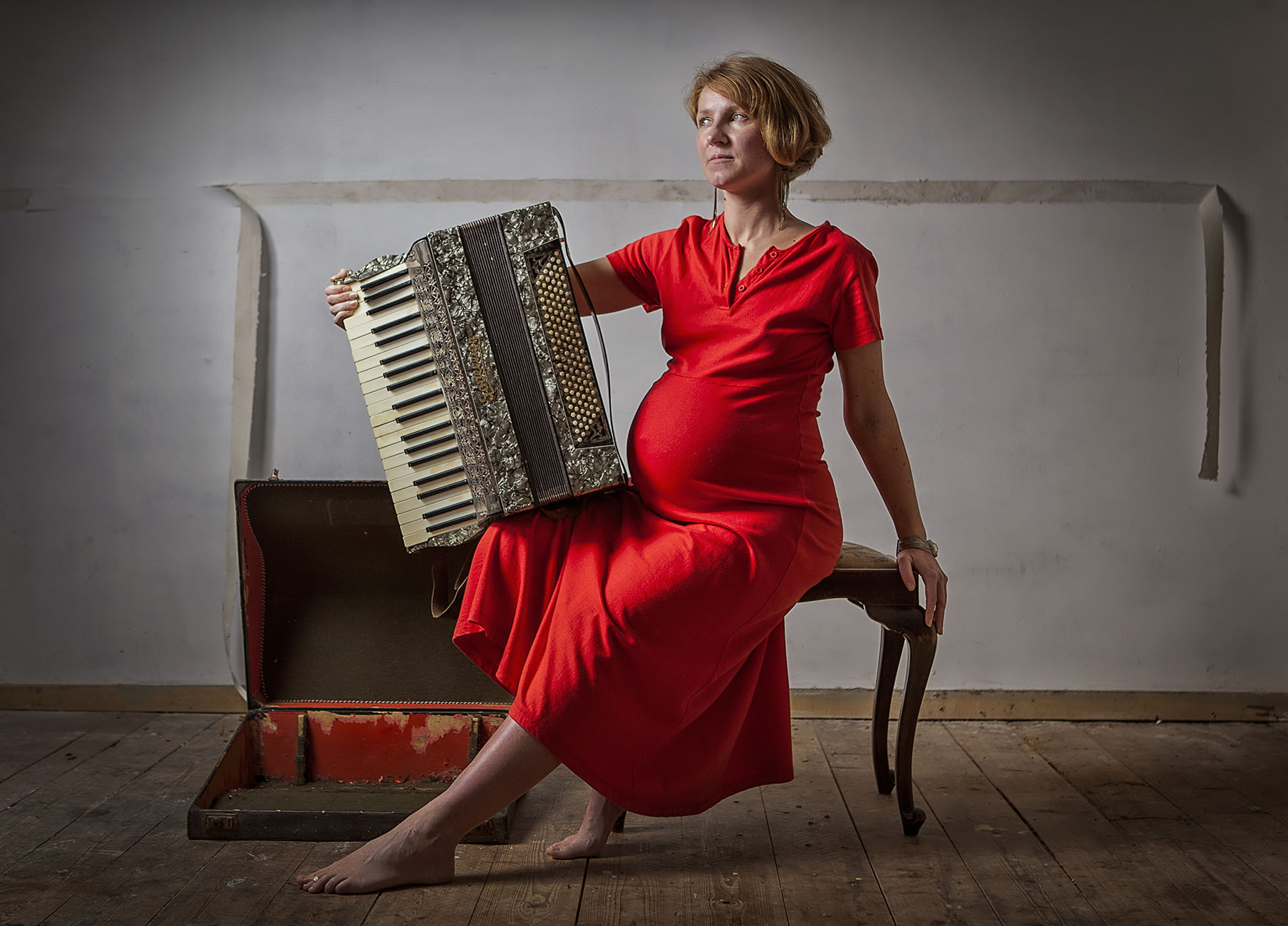 Artist Profile Balancing Act Polish pregnant woman in red dress portrait Aldona Kmiec 