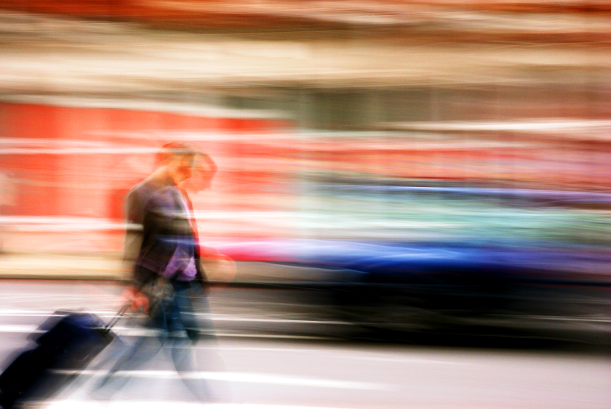 London Commuter Photography Migration traveller pan image We wander for distraction, but we travel for fulfilment