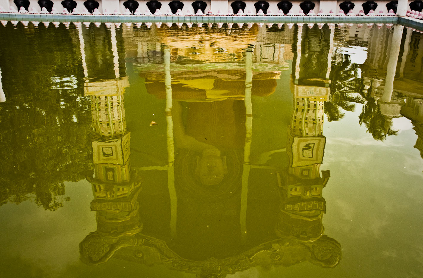 Buddist Temple water reflection in Negombo Sri Lanka Photo: Aldona Kmiec